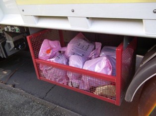 Households in Woking have received pink bags to leave out unwanted electrical items for recycling